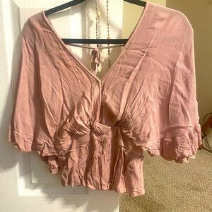 blush pink blouse